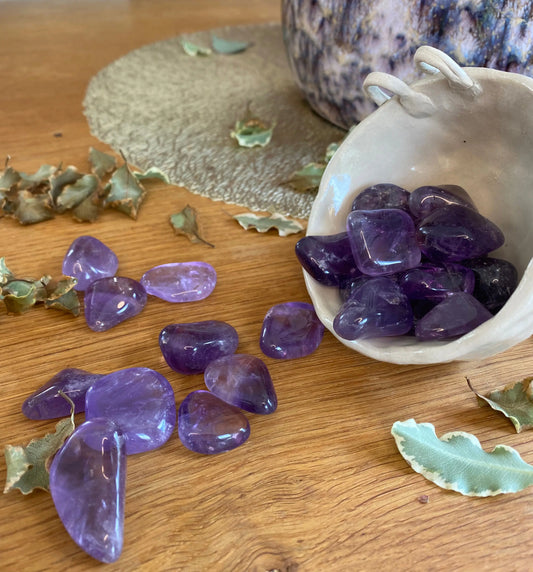 Pierre roulée Améthyste d.or.é.mi